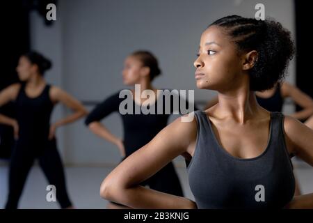 Female dancer practicing a dance routine in a studio Stock Photo