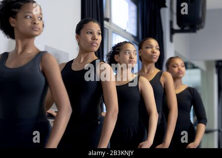 Group of female dancers practicing a dance routine in a studio Stock Photo