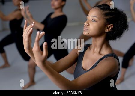 Female dancers practicing a dance routine in a studio Stock Photo