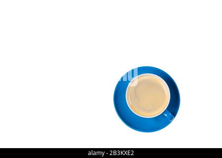 Bright colored coffee cup on a table top view Stock Photo