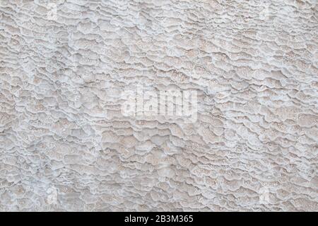 Such pattern is made from adarce (Caucasus Mountains, Georgia). Travertine is a form of limestone deposited by mineral springs. Stock Photo
