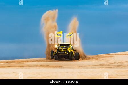 Sand Buggy racing in the sand dunes of the Qatari desert Stock Photo