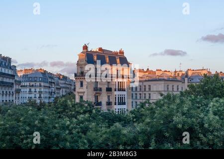 This is street view from above of the Boulevard Richard-Lenoir with Haussmann buildings and the large central tree-lined walkway in Paris, France. Stock Photo