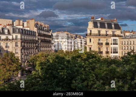 This is street view from above of the Boulevard Richard-Lenoir with Haussmann buildings and the large central tree-lined walkway in Paris, France. Stock Photo