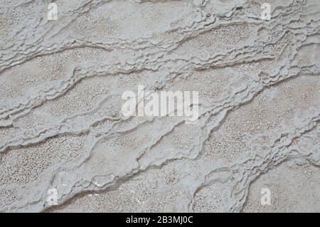 Such pattern is made from adarce. Travertine is a form of limestone deposited by mineral springs. Stock Photo