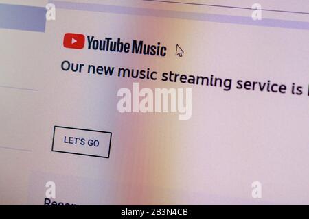 Youtube Music home menu and arrow cursor on device screen pixelated close up view. Bucharest, Romania, 2020. Stock Photo
