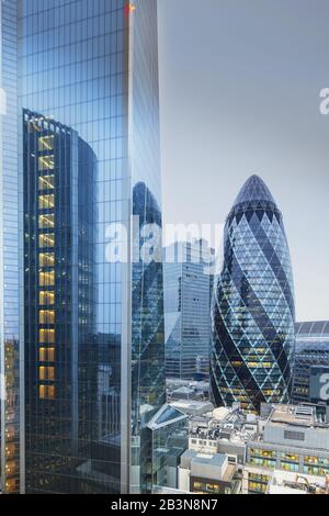 The City of London financial district skyline showing the Scalpel building (52-54 Lime Street) and the Gherkin (30 St. Mary Axe), London, England, Uni Stock Photo