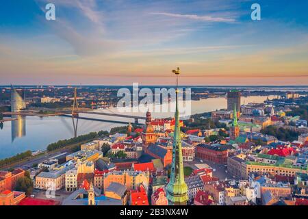 Skyline of Riga old town, sunrise time. Riga is the capital and the largest city of Latvia Stock Photo