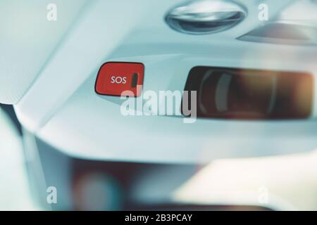 SOS button in a car as a symbol for the eCall system in European cars ...