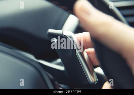 Gear up leverage in sequence gearbox in modern car. Stock Photo