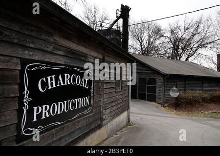 Making charcoal at Jack Daniel's , Jack Daniel Distillery, Tichnor