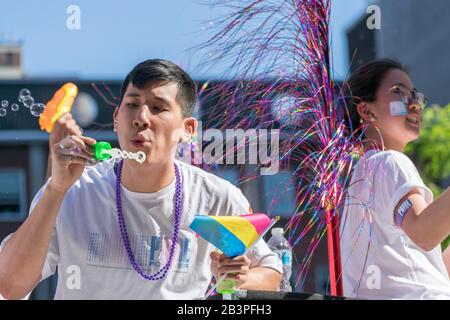 A man blows bubbles at the Toronto Pride parade June 2019 Stock Photo