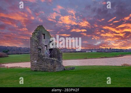 The remains of the old Engine House that served Auchenharvie Colliery in the Ayrshire town of Ardeer in Stevenston North Ayrshire Scotland. at sunset Stock Photo
