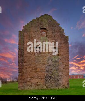 The remains of the old Engine House that served Auchenharvie Colliery in the Ayrshire town of Ardeer in Stevenston North Ayrshire Scotland at sunset Stock Photo