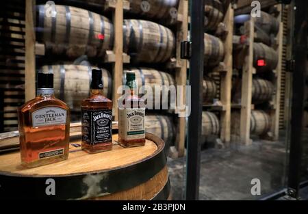 A bottle of Gentleman Jack, Jack Daniel No.7 and Jack Daniels Rye whiskey display in tasting barrelhouse of Jack Daniel's Distillery. Lynchburg.Tennessee.USA Stock Photo