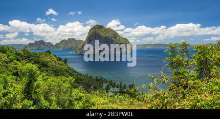 Panoramic landscape of Palawan epic view to Pinagbuyutan island on horizon. El Nido-Philippines. Best natural wonder in Southeast Asia Bacuit Stock Photo