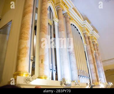 part of the church organ with many air pipes made of metal Stock Photo