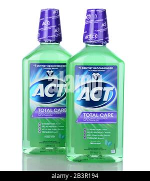 IRVINE, CA - January 05, 2014: Two bottles of ACT Total Care Anticavity Mouthwash. Two 1 liter bottles of the oral hygiene mouthwash with fluoride. Stock Photo