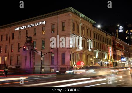 The night view of Whiskey Row and downtown of Louisville with the neon sign  of Old Forester Distilling Co in foreground.Kentucky.USA Stock Photo - Alamy