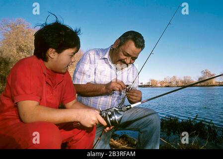 Hispanic boy fishing hi-res stock photography and images - Alamy