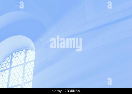 Light rays through the window. Pale blue toned photo Stock Photo