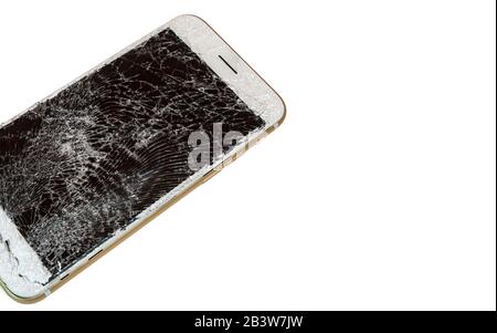 Modern smartphone with highly broken screen isolated on white background. Stock Photo