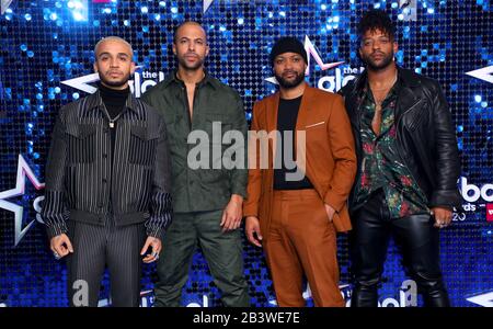 (left to right) Aston Merrygold, Marvin Humes, JB Gill and Oritse Williams of JLS attend The Global Awards 2020 with Very.co.uk at London's Eventim Apollo Hammersmith. Stock Photo