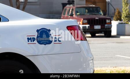 Seal of the Metropolitan Police Department of the District of Columbia (Metro PD) on the side of police cruiser in downtown Washington. Stock Photo