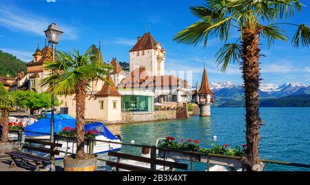 Oberhofen castle on Lake Thun in Bernese Highlands Alps mountains, Canton Bern, Switzerland Stock Photo