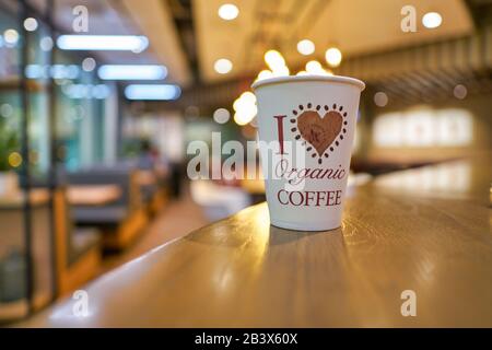 HONG KONG, CHINA - CIRCA JANUARY, 2019: close up shot of a paper cup on a table at Pret a Manger. Pret a Manger is an international sandwich shop chai Stock Photo
