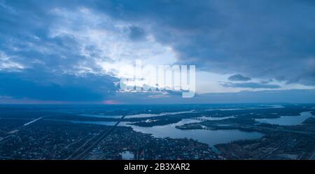 Beautiful panoramic aerial view of the Dnieper River and the North Bridge or Moscow Bridge from the left bank. Stock Photo