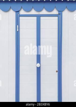 Beautiful wooden wall with blue stripes of a cloakroom on the beach. Image made on mobile phone Stock Photo