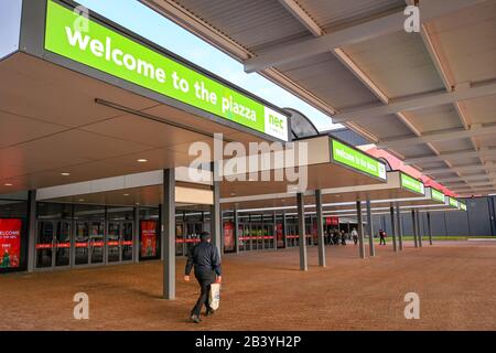 BIRMINGHAM, ENGLAND - DECEMBER 2019: 'Welcome to the Piazza' LED signs at the entrance to the Birmingham National Exhibition Centre. Stock Photo