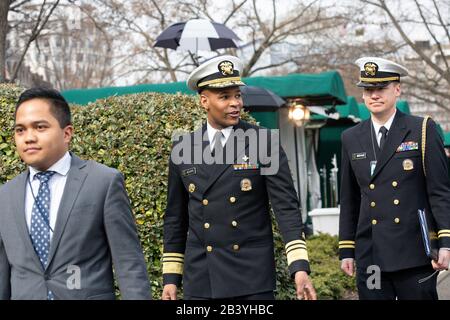 United States Surgeon General Jerome M. Adams, center, walks away after speaking during a television interview outside the White House in Washington D.C., U.S., on Thursday, March 5, 2020.  Credit: Stefani Reynolds / CNP /MediaPunch Stock Photo