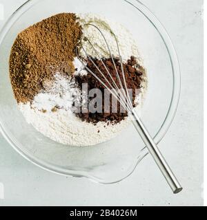 dry ingredients in a baking bowl. mixing products Stock Photo