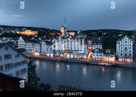Aerial view of Old Town and river Limmat during morning blue hour in Old Town of Zurich, the largest city in Switzerland Stock Photo