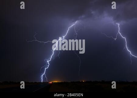 A lightning strike hits an electrical substation during a thunderstorm near Phoenix, Arizona Stock Photo