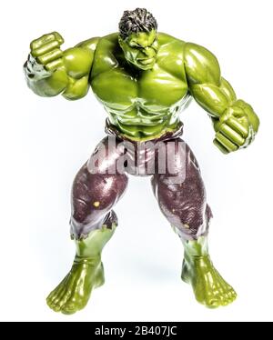 Action figure of a muscular angry green man, small toy Stock Photo