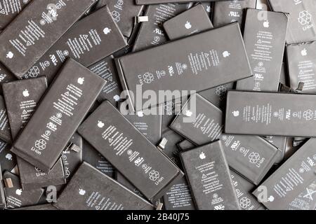 St. Petersburg, Russia - December 2, 2019: Close up of used Li-ion Polymer batteries of Apple iPhone preparation for recycling Stock Photo