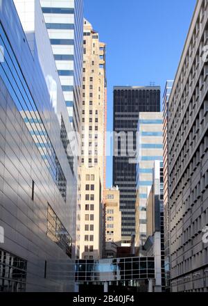 A vertical view of an alley surrounded by skyscrapers in downtown Oklahoma City. Stock Photo