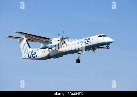 A Flybe bombardier making a landing at Leeds Bradford International Airport. Stock Photo