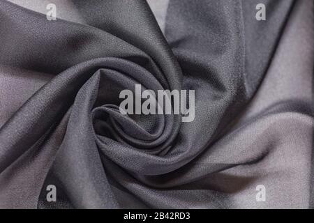 Shiny grey cloth background dark curly background Stock Photo