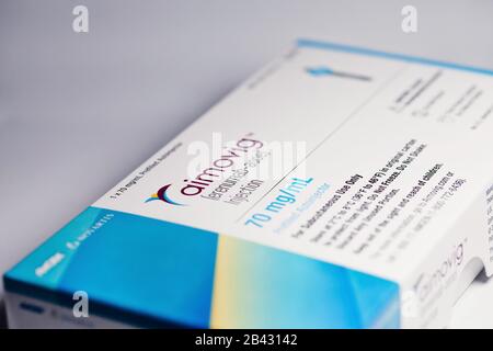 Closeup of Aimovig 70 mg package, new injectable prescription drug for migraine prevention, studio, color, United States Stock Photo