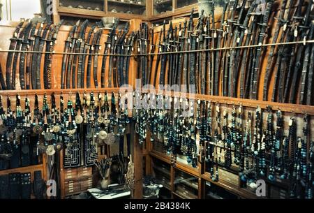 Thousands of relics from the Ainu, who have been called the “hairy aborigines” of Japan, were on display at the Medical School at Hokkaido University when this historical photograph was taken in 1962 on the island of Hokkaido in northern Japan. At the top are swords in their scabbards mostly worn for show during festivals and religious ceremonies. Below them are beaded necklaces, some with large metal pendants, which were the favorite adornments of Ainu women. The Ainu (pronounced I-noo) were officially recognized as indigenous people of Japan in 2008.