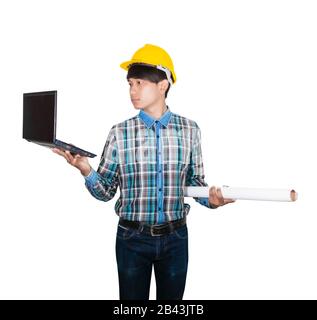 businessman young hold Laptop computer and rolled blueprints wear yellow safety helmet plastic on white background construction concept Stock Photo