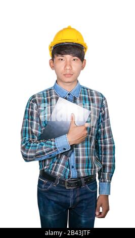 businessman young hold Laptop computer wear yellow safety helmet plastic on white background construction concept Stock Photo
