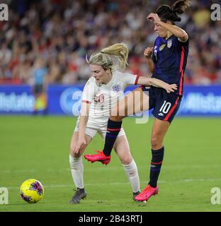 Orlando, Florida, USA. 5th Mar, 2020. United States forward CARLI LLOYD (10) defends the ball against England forward LAUREN HEMP (20) during the SheBelieves Cup United States vs England match at Exploria Stadium in Orlando, Fl on March 5, 2020. Credit: Cory Knowlton/ZUMA Wire/Alamy Live News Stock Photo