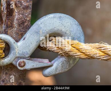 Loop Stake For Rope A thick rope looped around a rusted stake image with copy space in ...