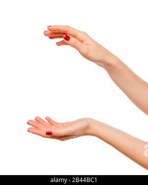 Close-up of beautiful woman's hands, palms up. Isolated on white background Stock Photo