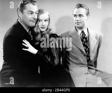 BRIAN DONLEVY VERONICA LAKE and ALAN LADD Posed Publicity Portrait for THE GLASS KEY 1942 director STUART HEISLER based on novel by DASHIELL HAMMETT costume designer EDITH HEAD Paramount Pictures Stock Photo